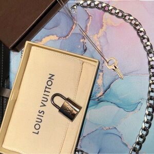 Stunning Louis Vuitton Silver Padlock 322/Key 322. Includes SS 18” & BONUS chain